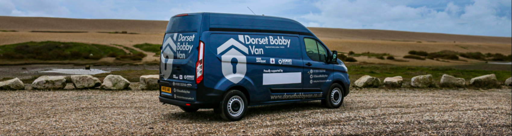 Dorset Bobby Van overlooking a field